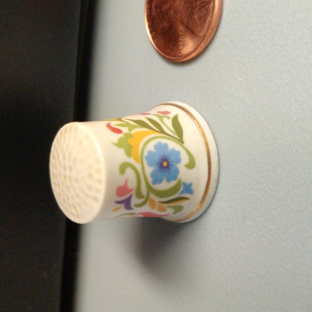 Vintage Avon floral thimble, gold trim